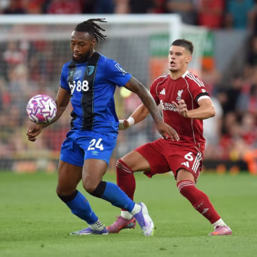 [1/2]Soccer Football - Premier League - Liverpool v AFC Bournemouth - Anfield, Liverpool, Britain - August 15, 2025 AFC Bournemouth's Antoine Semenyo in action with Liverpool's Milos Kerkez REUTERS/Peter Powell Purchase Licensing Rights