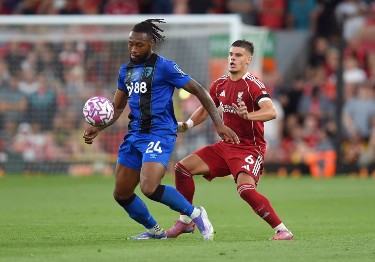 [1/2]Soccer Football - Premier League - Liverpool v AFC Bournemouth - Anfield, Liverpool, Britain - August 15, 2025 AFC Bournemouth's Antoine Semenyo in action with Liverpool's Milos Kerkez REUTERS/Peter Powell Purchase Licensing Rights